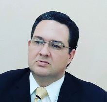 CARLOS ESCAURIZA, ABOGADO